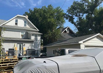 Shingled roof on garage at 561 Hochelega st west and painted deck